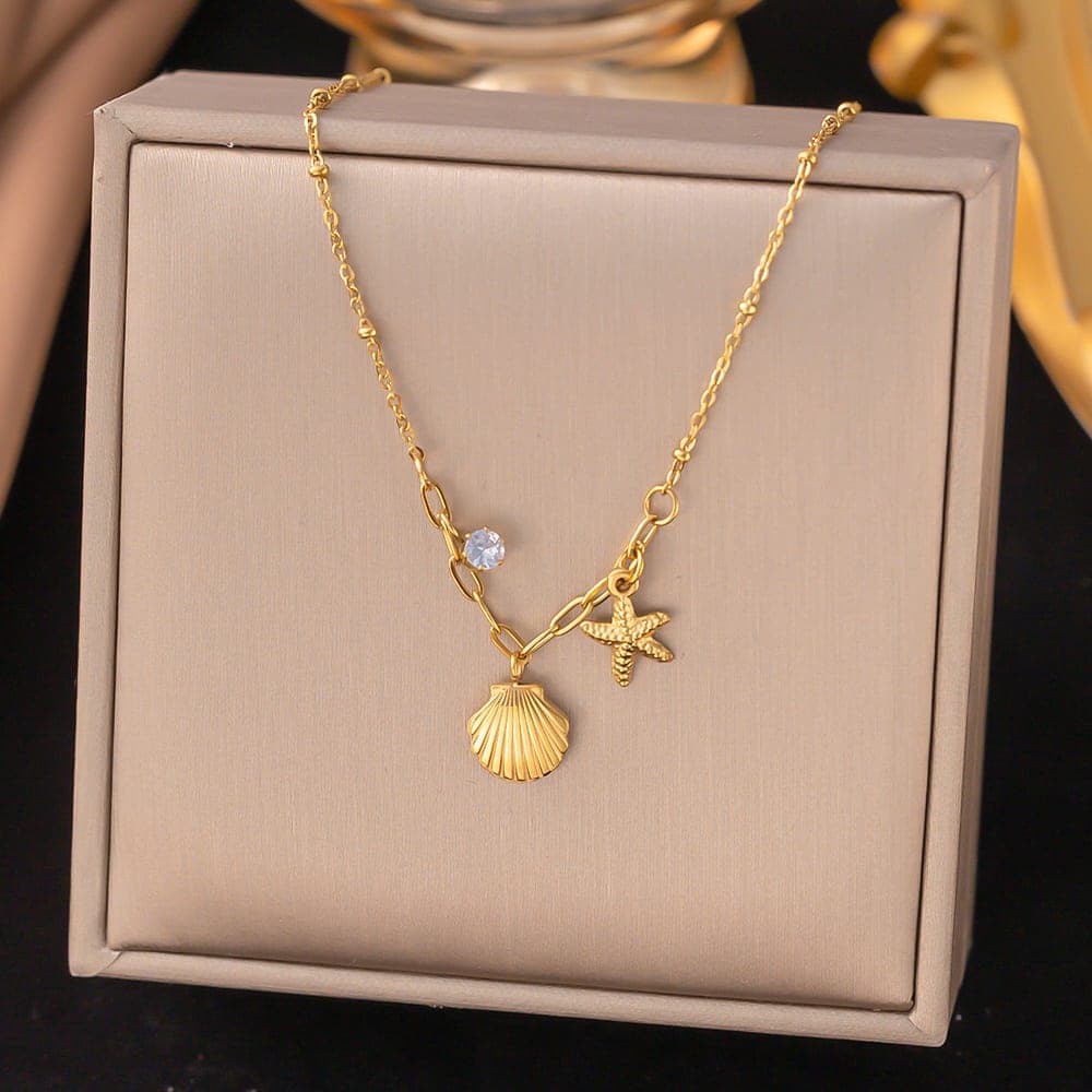 Gold Plated Sea Shell & Starfish Charm Necklace for Women & Girls | Crystal Accent Beach Style Fashion Necklace | Pack of 1 — view 1